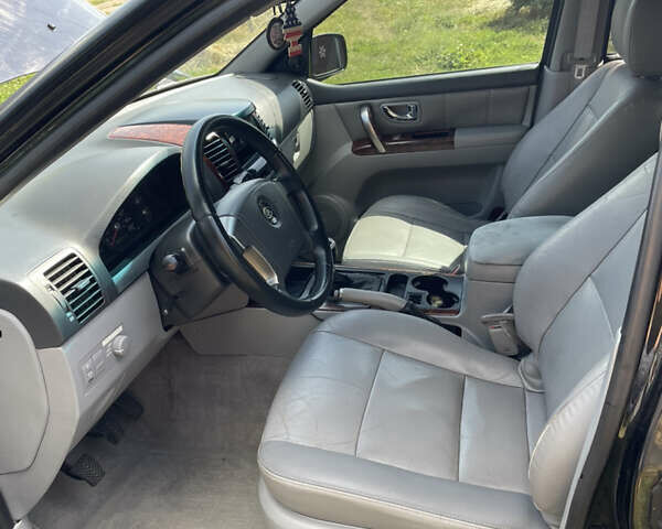 Чорний Кіа Соренто, об'ємом двигуна 2.5 л та пробігом 345 тис. км за 5100 $, фото 9 на Automoto.ua