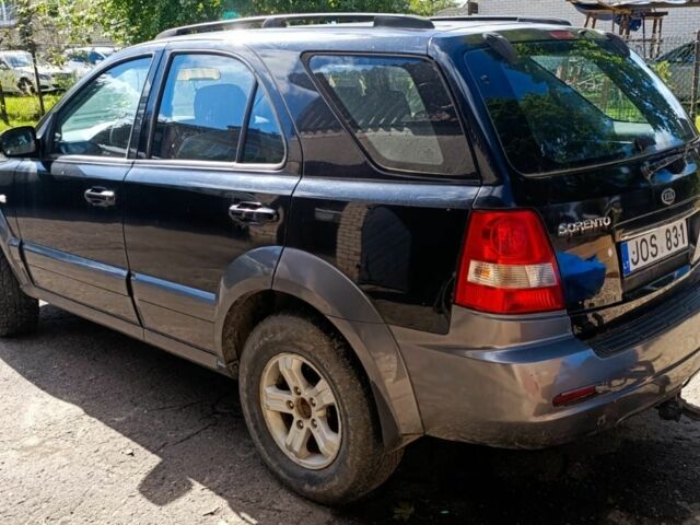 Черный Киа Соренто, объемом двигателя 2.4 л и пробегом 310 тыс. км за 3650 $, фото 4 на Automoto.ua