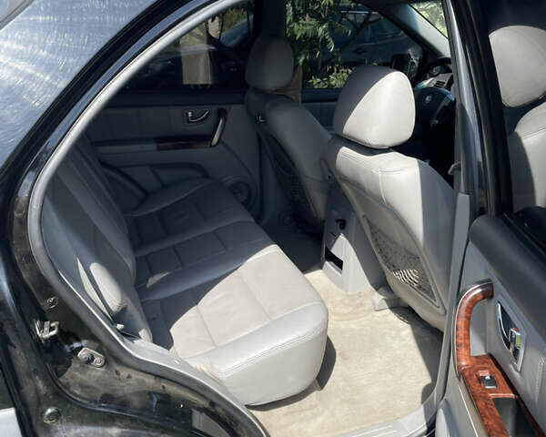 Чорний Кіа Соренто, об'ємом двигуна 2.5 л та пробігом 345 тис. км за 5100 $, фото 13 на Automoto.ua