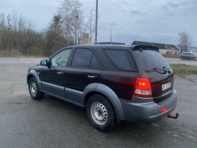 Черный Киа Соренто, объемом двигателя 2.5 л и пробегом 250 тыс. км за 4150 $, фото 4 на Automoto.ua