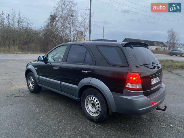 Черный Киа Соренто, объемом двигателя 2.5 л и пробегом 250 тыс. км за 4150 $, фото 3 на Automoto.ua