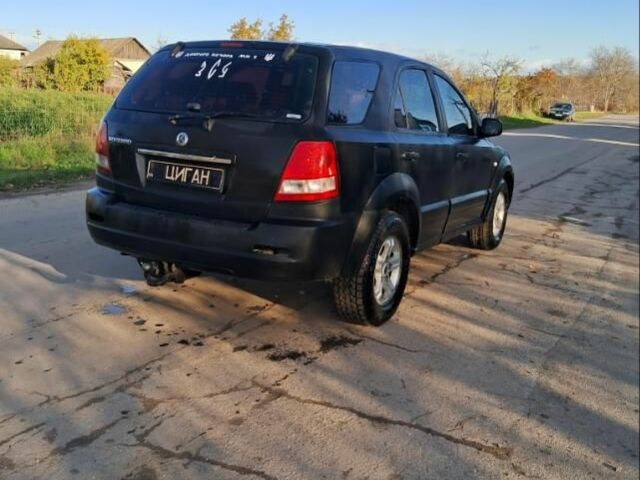 Черный Киа Соренто, объемом двигателя 2.5 л и пробегом 310 тыс. км за 3800 $, фото 1 на Automoto.ua