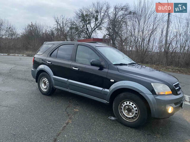 Черный Киа Соренто, объемом двигателя 2.5 л и пробегом 250 тыс. км за 4150 $, фото 10 на Automoto.ua