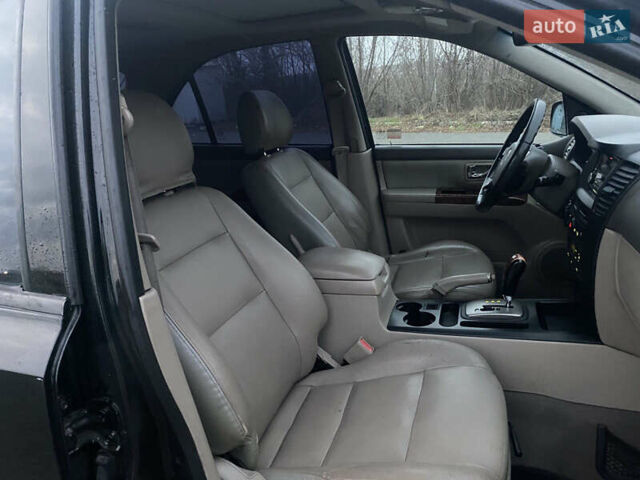 Черный Киа Соренто, объемом двигателя 2.5 л и пробегом 250 тыс. км за 4150 $, фото 15 на Automoto.ua