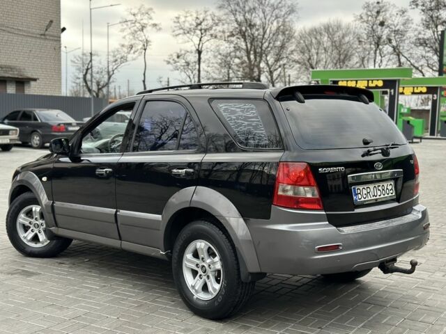 Черный Киа Соренто, объемом двигателя 2.5 л и пробегом 218 тыс. км за 4500 $, фото 2 на Automoto.ua