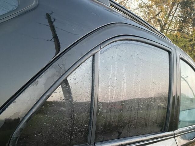 Черный Киа Соренто, объемом двигателя 2.5 л и пробегом 200 тыс. км за 7100 $, фото 2 на Automoto.ua