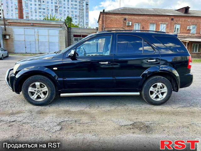 Черный Киа Соренто, объемом двигателя 2.5 л и пробегом 304 тыс. км за 3800 $, фото 1 на Automoto.ua