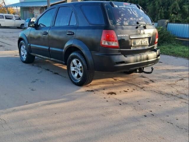 Черный Киа Соренто, объемом двигателя 2.5 л и пробегом 310 тыс. км за 3800 $, фото 2 на Automoto.ua
