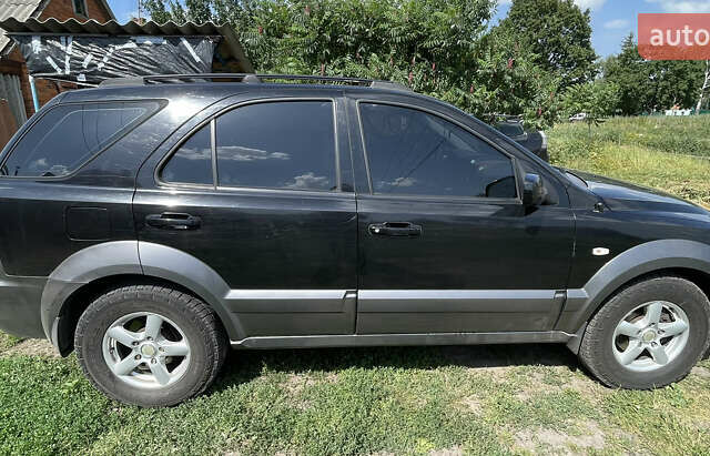 Чорний Кіа Соренто, об'ємом двигуна 2.5 л та пробігом 345 тис. км за 5100 $, фото 2 на Automoto.ua