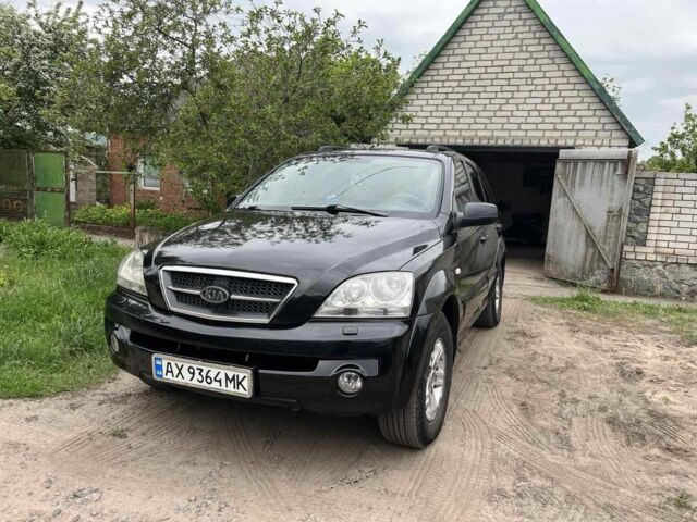 Черный Киа Соренто, объемом двигателя 2.5 л и пробегом 260 тыс. км за 6500 $, фото 1 на Automoto.ua
