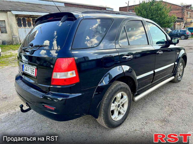 Черный Киа Соренто, объемом двигателя 2.5 л и пробегом 304 тыс. км за 3800 $, фото 5 на Automoto.ua