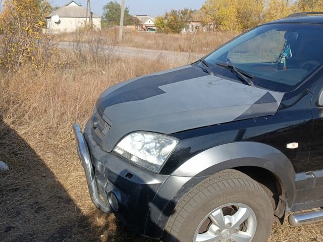 Киа Соренто 2004 в Изюме на Automoto.ua Черный Киа Соренто, объемом двигателя 2.5 л и пробегом 300 тыс. км за 5500 $, фото 6 на Automoto.ua