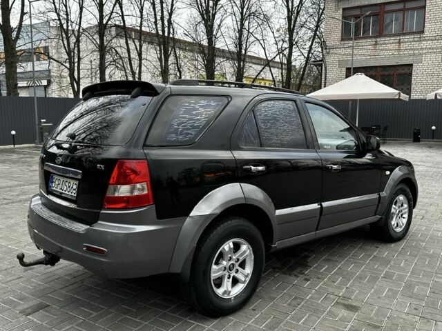 Черный Киа Соренто, объемом двигателя 2.5 л и пробегом 218 тыс. км за 4500 $, фото 5 на Automoto.ua