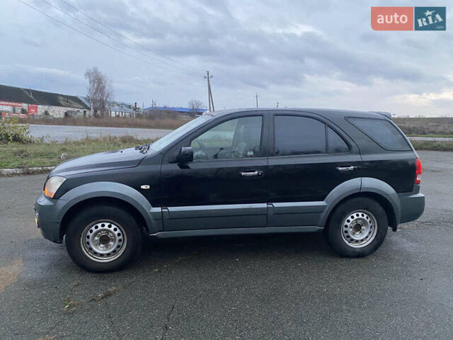Черный Киа Соренто, объемом двигателя 2.5 л и пробегом 250 тыс. км за 4150 $, фото 2 на Automoto.ua