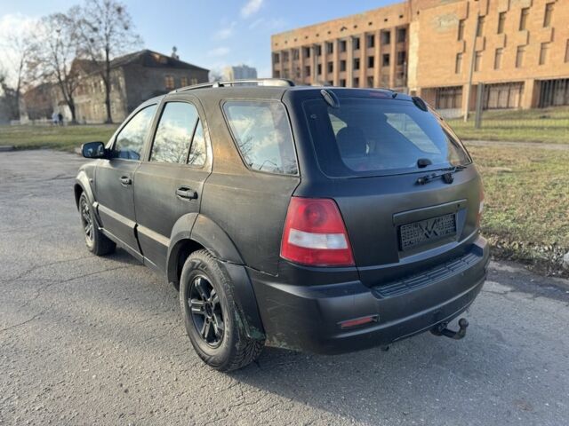 Черный Киа Соренто, объемом двигателя 2.5 л и пробегом 285 тыс. км за 3300 $, фото 3 на Automoto.ua