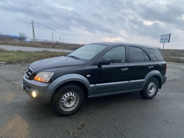 Черный Киа Соренто, объемом двигателя 2.5 л и пробегом 250 тыс. км за 4150 $, фото 1 на Automoto.ua