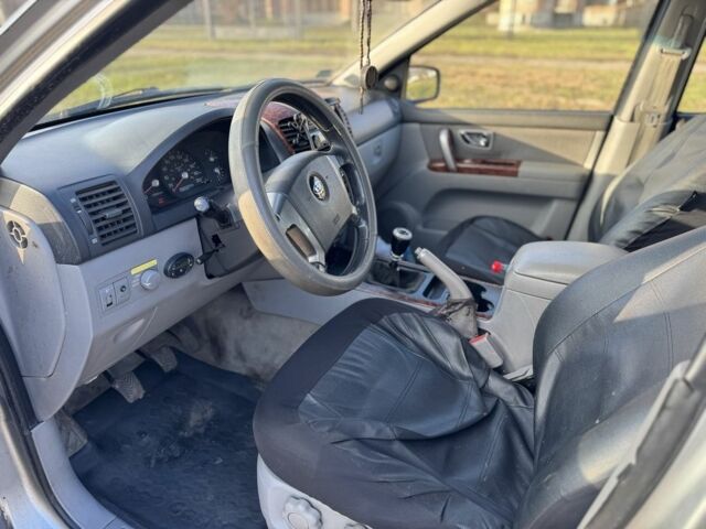 Черный Киа Соренто, объемом двигателя 2.5 л и пробегом 285 тыс. км за 3300 $, фото 6 на Automoto.ua