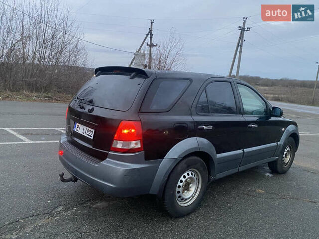 Черный Киа Соренто, объемом двигателя 2.5 л и пробегом 250 тыс. км за 4150 $, фото 5 на Automoto.ua