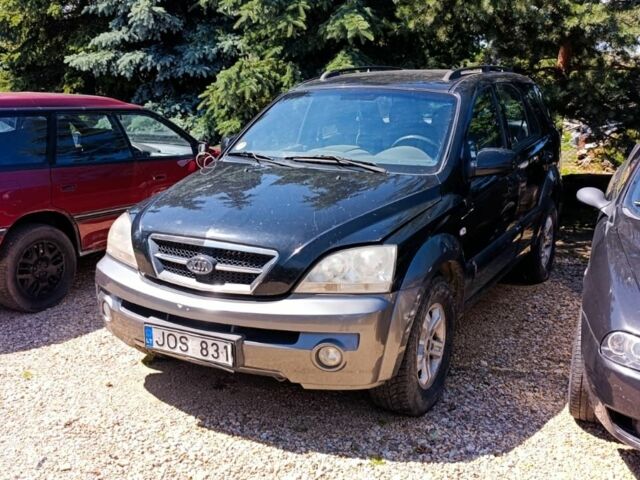 Черный Киа Соренто, объемом двигателя 2.4 л и пробегом 310 тыс. км за 3650 $, фото 1 на Automoto.ua