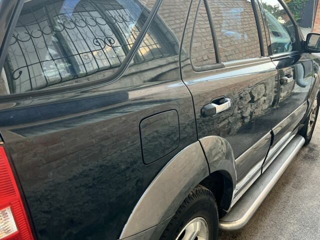 Черный Киа Соренто, объемом двигателя 2.5 л и пробегом 216 тыс. км за 148000 $, фото 2 на Automoto.ua