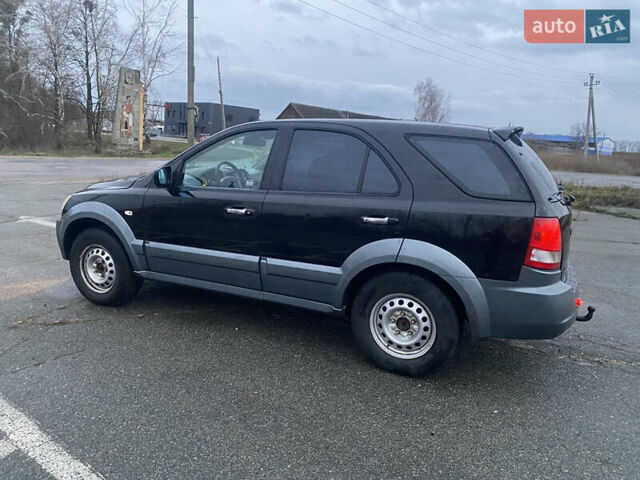 Черный Киа Соренто, объемом двигателя 2.5 л и пробегом 250 тыс. км за 4150 $, фото 6 на Automoto.ua