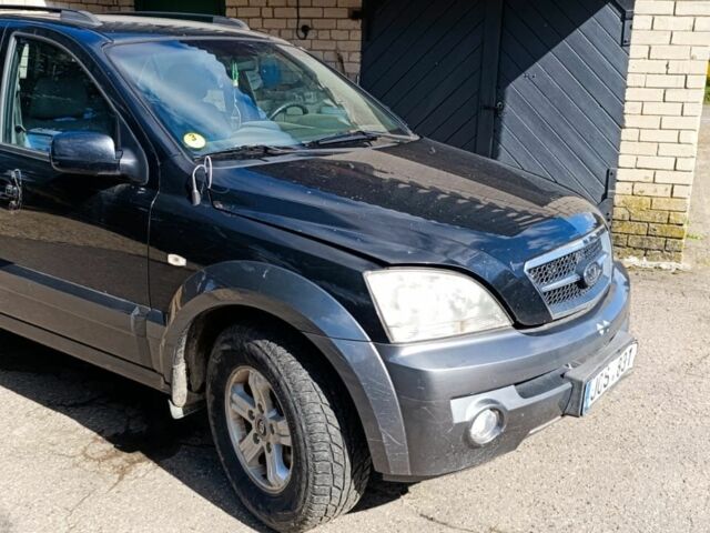 Черный Киа Соренто, объемом двигателя 2.4 л и пробегом 310 тыс. км за 3650 $, фото 5 на Automoto.ua