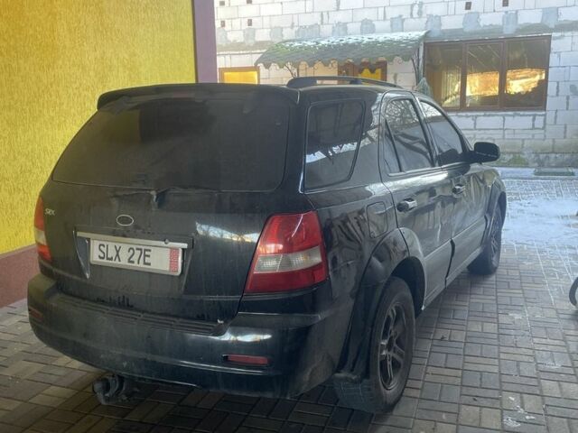 Черный Киа Соренто, объемом двигателя 2.5 л и пробегом 280 тыс. км за 2550 $, фото 4 на Automoto.ua