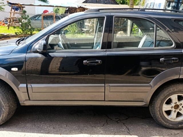 Черный Киа Соренто, объемом двигателя 2.4 л и пробегом 310 тыс. км за 3650 $, фото 3 на Automoto.ua