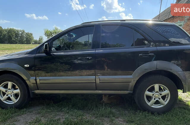 Чорний Кіа Соренто, об'ємом двигуна 2.5 л та пробігом 345 тис. км за 5100 $, фото 3 на Automoto.ua