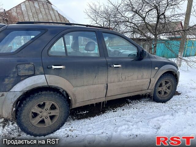 Черный Киа Соренто, объемом двигателя 2.5 л и пробегом 295 тыс. км за 4000 $, фото 5 на Automoto.ua