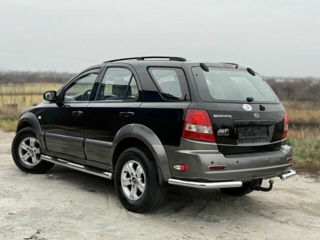 Черный Киа Соренто, объемом двигателя 2.5 л и пробегом 258 тыс. км за 5250 $, фото 4 на Automoto.ua