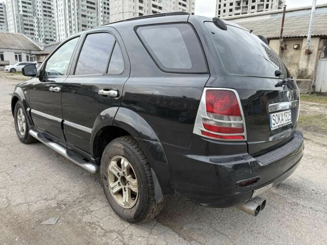 Черный Киа Соренто, объемом двигателя 2.5 л и пробегом 254 тыс. км за 3700 $, фото 2 на Automoto.ua