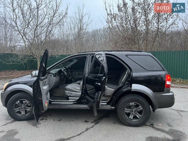 Черный Киа Соренто, объемом двигателя 2.5 л и пробегом 340 тыс. км за 7500 $, фото 10 на Automoto.ua