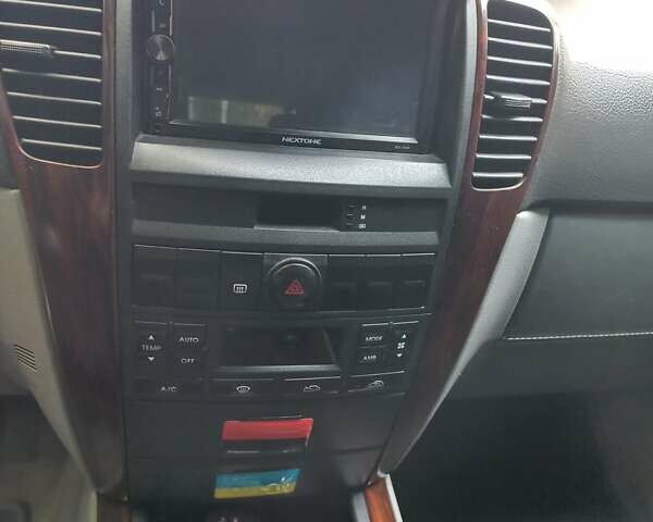 Чорний Кіа Соренто, об'ємом двигуна 2.4 л та пробігом 230 тис. км за 6800 $, фото 7 на Automoto.ua