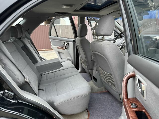 Черный Киа Соренто, объемом двигателя 2.5 л и пробегом 258 тыс. км за 5250 $, фото 16 на Automoto.ua