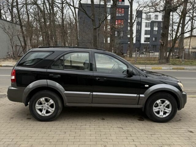 Чорний Кіа Соренто, об'ємом двигуна 2.5 л та пробігом 198 тис. км за 4950 $, фото 5 на Automoto.ua