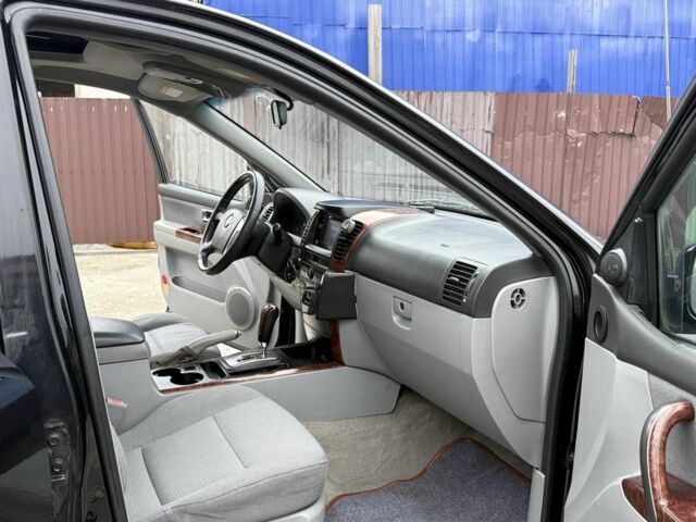 Черный Киа Соренто, объемом двигателя 2.5 л и пробегом 258 тыс. км за 5250 $, фото 18 на Automoto.ua