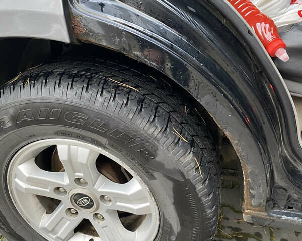 Черный Киа Соренто, объемом двигателя 2.4 л и пробегом 260 тыс. км за 5899 $, фото 5 на Automoto.ua