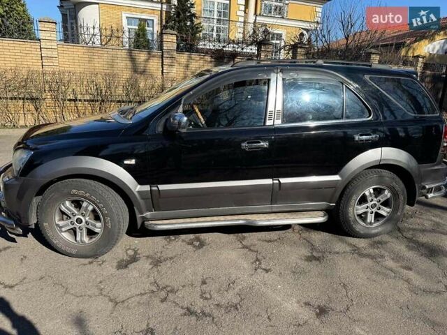 Черный Киа Соренто, объемом двигателя 2.4 л и пробегом 159 тыс. км за 6850 $, фото 6 на Automoto.ua