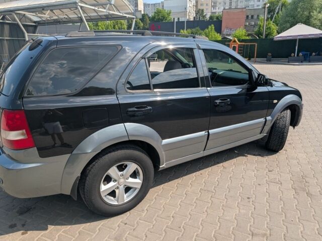 Чорний Кіа Соренто, об'ємом двигуна 2.5 л та пробігом 357 тис. км за 7600 $, фото 3 на Automoto.ua