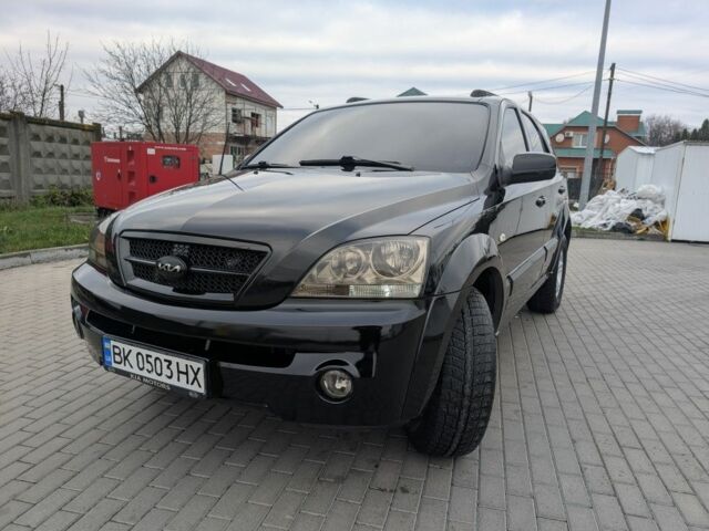 Черный Киа Соренто, объемом двигателя 2.5 л и пробегом 300 тыс. км за 8000 $, фото 1 на Automoto.ua