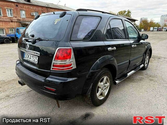 Черный Киа Соренто, объемом двигателя 2.5 л и пробегом 254 тыс. км за 3700 $, фото 5 на Automoto.ua