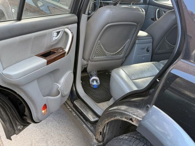 Черный Киа Соренто, объемом двигателя 2.5 л и пробегом 217 тыс. км за 5515 $, фото 4 на Automoto.ua