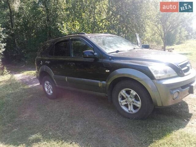 Черный Киа Соренто, объемом двигателя 2.5 л и пробегом 137 тыс. км за 5000 $, фото 5 на Automoto.ua