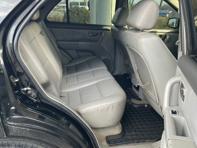 Черный Киа Соренто, объемом двигателя 2.5 л и пробегом 270 тыс. км за 3350 $, фото 17 на Automoto.ua