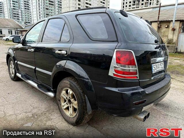 Черный Киа Соренто, объемом двигателя 2.5 л и пробегом 254 тыс. км за 3700 $, фото 2 на Automoto.ua