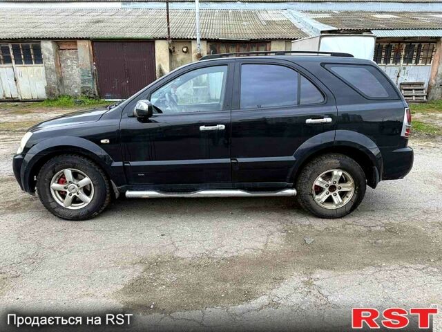 Черный Киа Соренто, объемом двигателя 2.5 л и пробегом 254 тыс. км за 3700 $, фото 1 на Automoto.ua