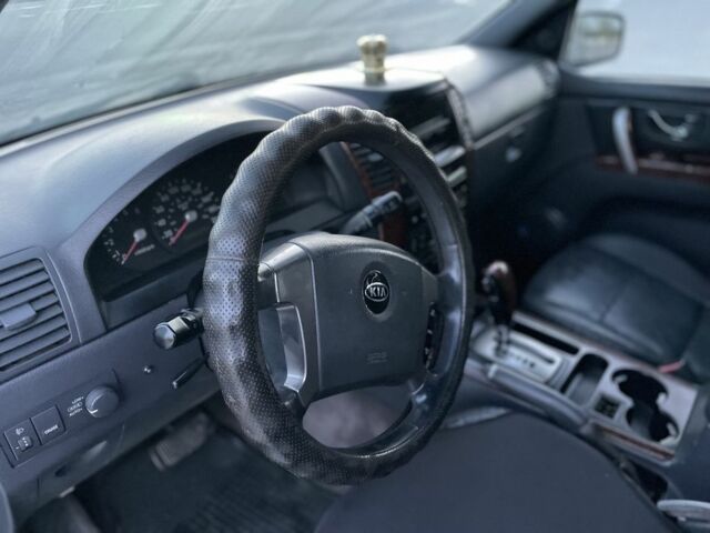 Черный Киа Соренто, объемом двигателя 2.5 л и пробегом 310 тыс. км за 3950 $, фото 21 на Automoto.ua