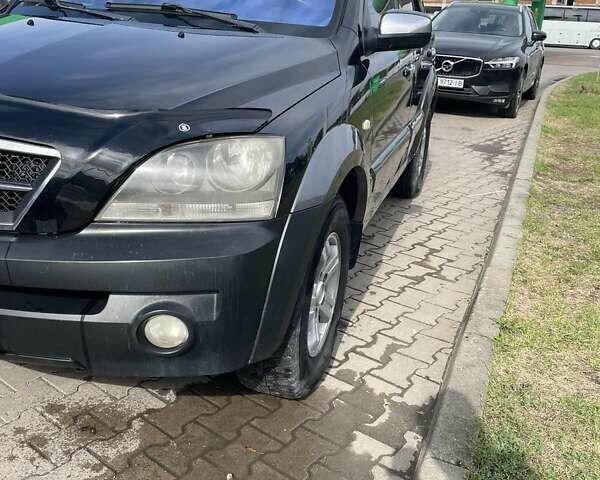 Черный Киа Соренто, объемом двигателя 2.5 л и пробегом 248 тыс. км за 7199 $, фото 15 на Automoto.ua