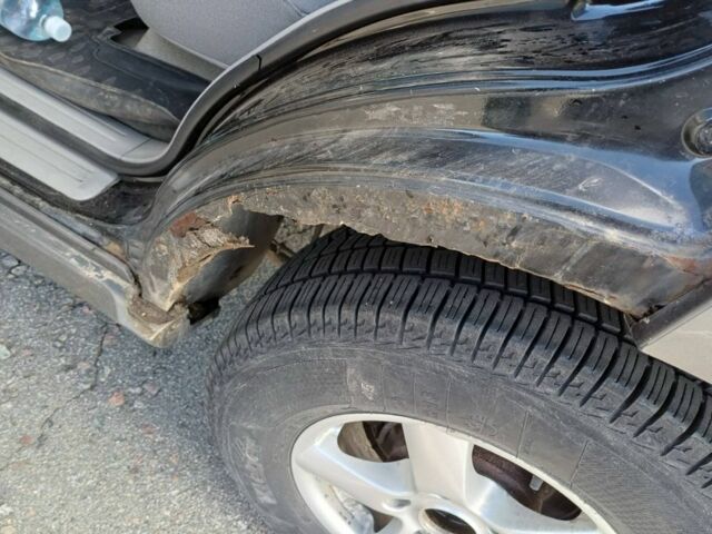 Черный Киа Соренто, объемом двигателя 2.5 л и пробегом 327 тыс. км за 3400 $, фото 2 на Automoto.ua